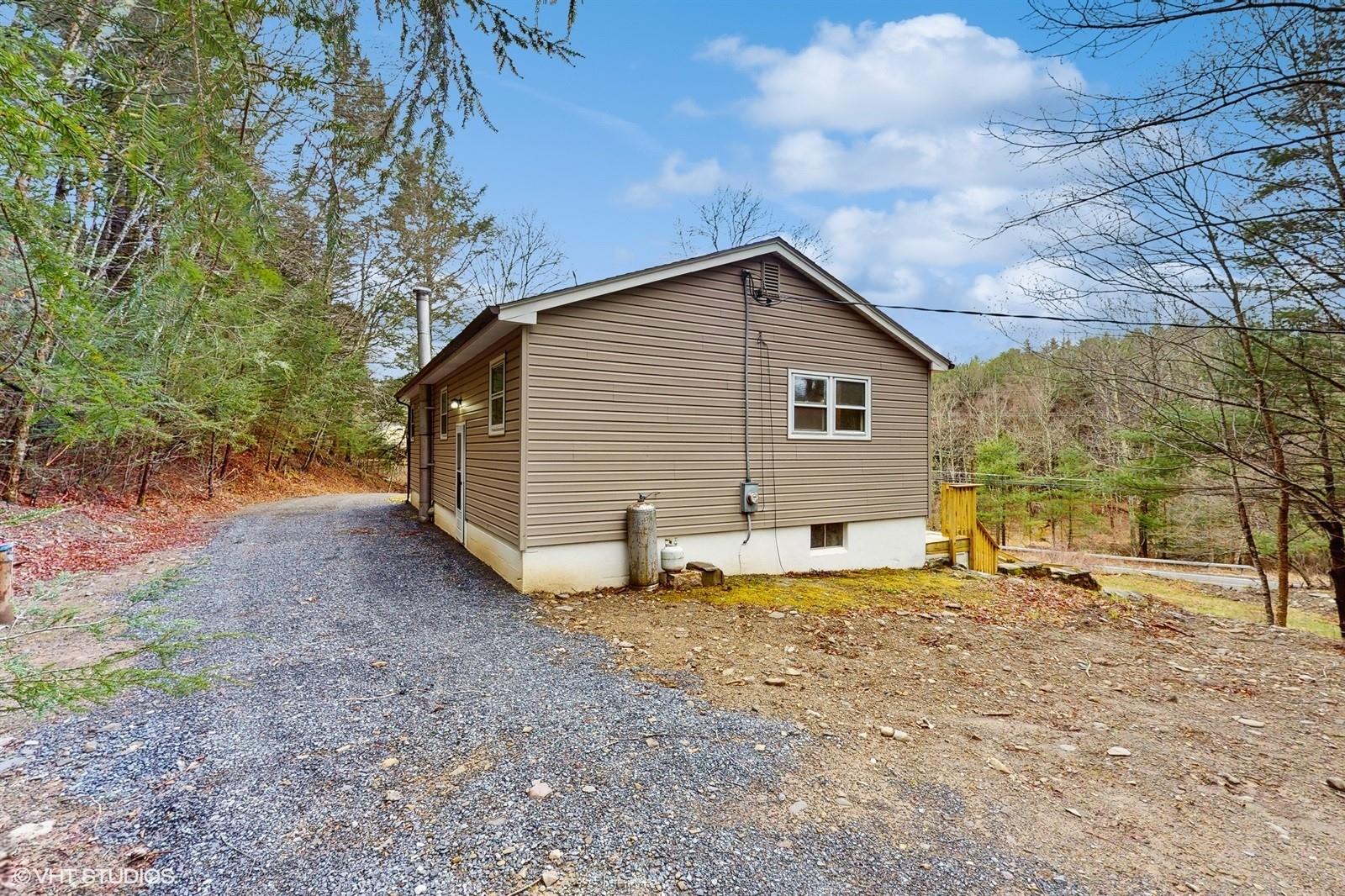 736 State Rte 55 Napanoch, NY 12458 - Photo 25 of 49 a view of a house with a yard