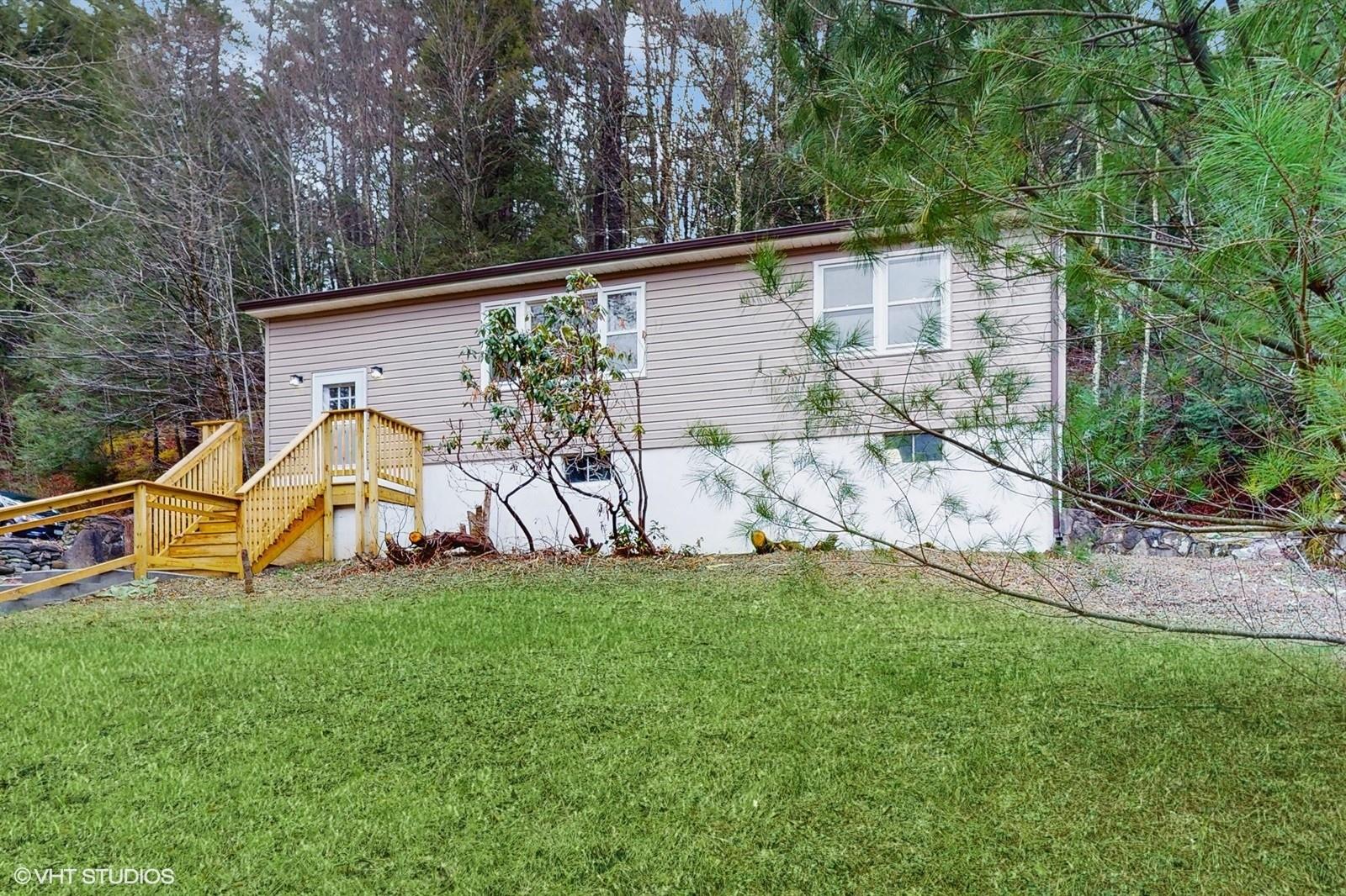 736 State Rte 55 Napanoch, NY 12458 - Photo 4 of 49 a view of a backyard with a sitting area