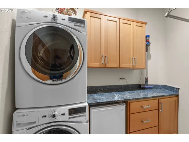 a picture of a bathroom with a sink and a mirror