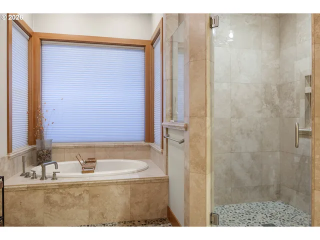 a bathroom with a toilet a sink and a mirror