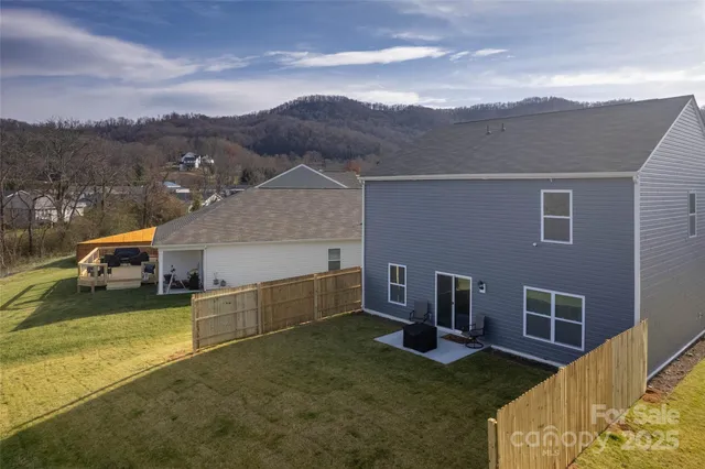 a view of lake with mountain in the background