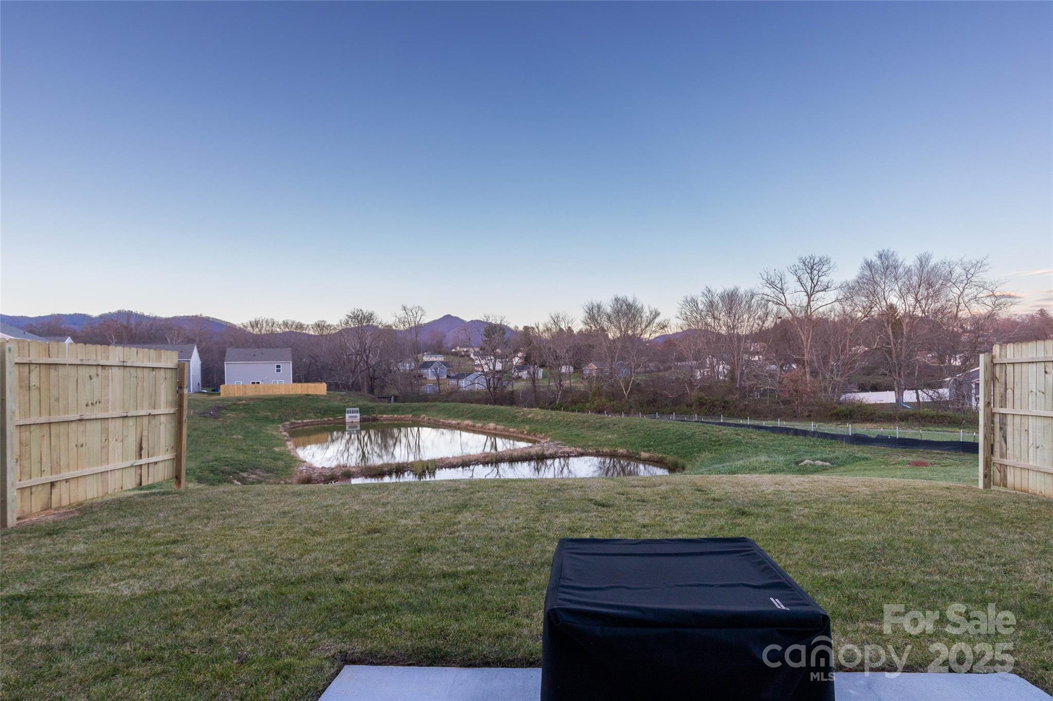 84 Madelyn Drive Clyde, NC 28721 - Photo 29 of 29 a view of lake with mountain in the background