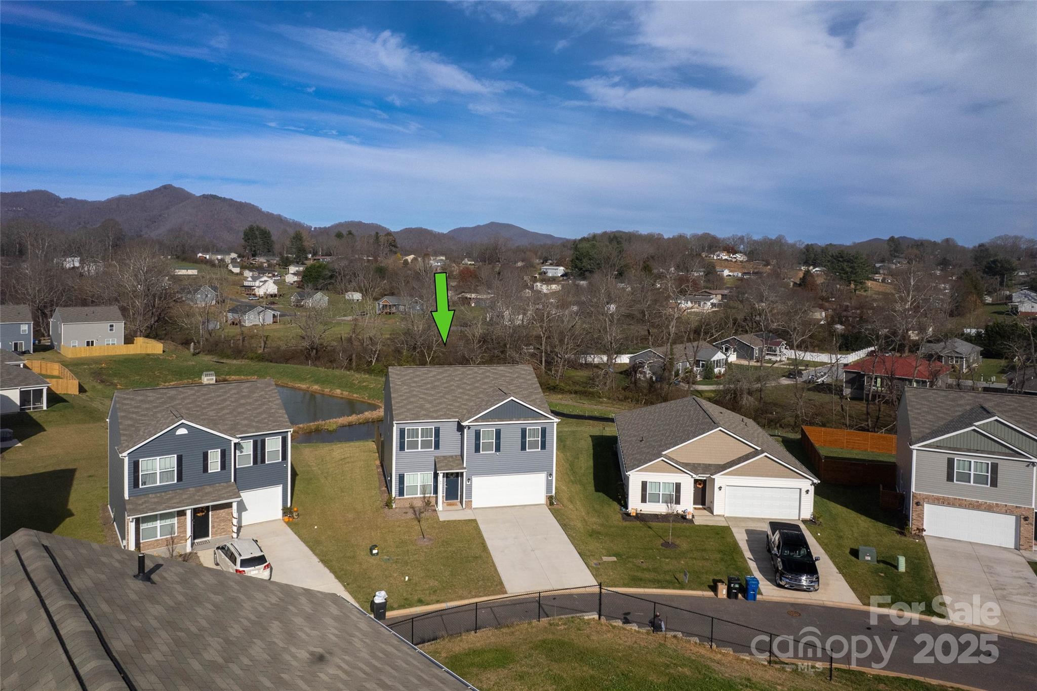 84 Madelyn Drive Clyde, NC 28721 - Photo 4 of 29 an aerial view of a house with a big yard