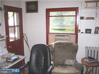 309 South Chester Road Swarthmore, PA 19081 - Photo 6 of 8 a living room with furniture and a window