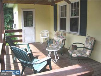 309 South Chester Road Swarthmore, PA 19081 - Photo 7 of 8 a backyard of a house with table and chairs