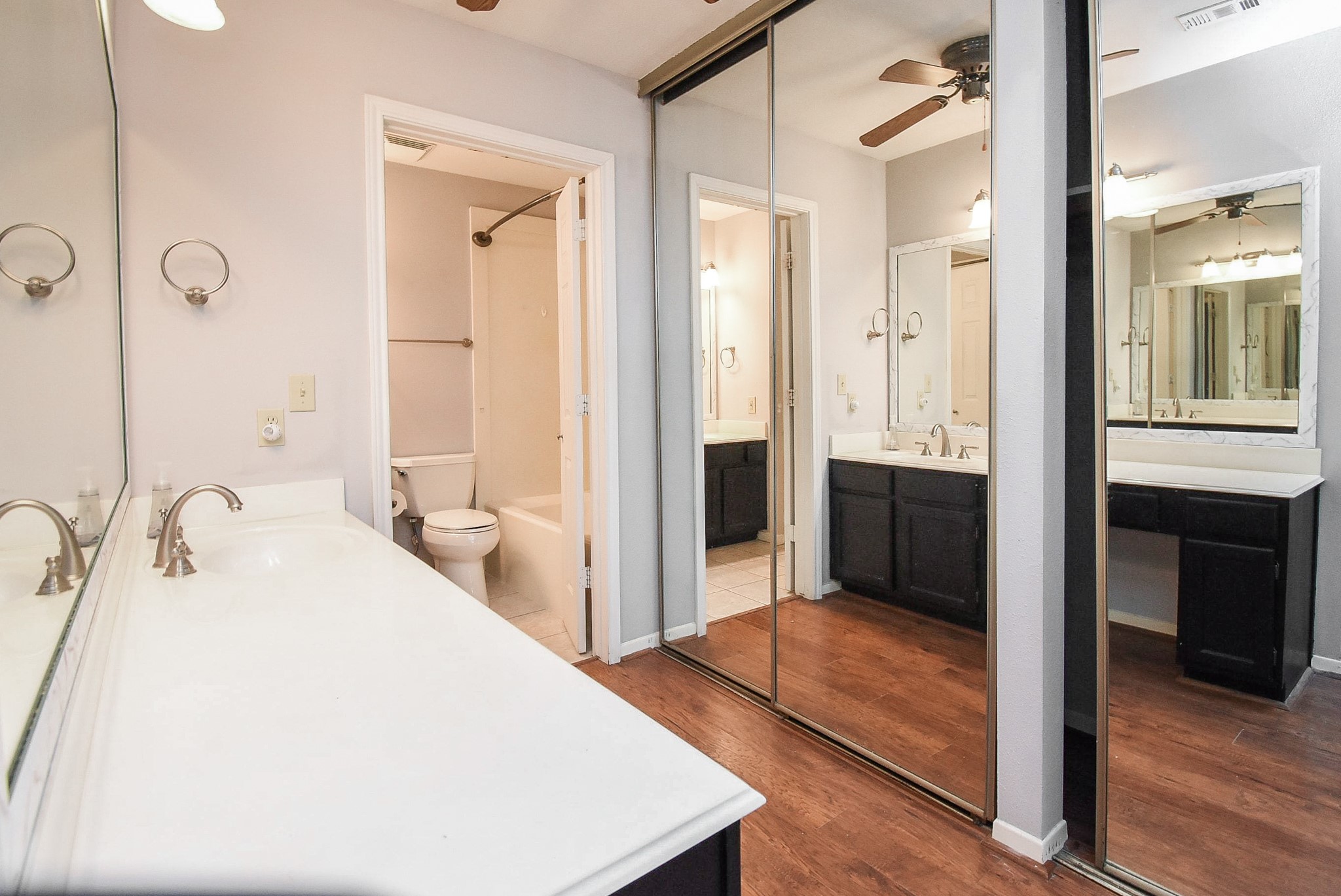 9107 Wallingham Court Spring, TX 77379 - Photo 19 of 25 a en suite bathroom with a sink and a large mirror