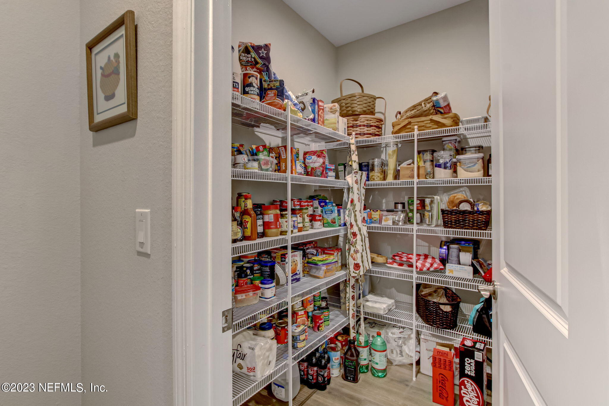85276 Berryessa Way Yulee, FL 32097 - Photo 20 of 42 a room with a book shelf and a book shelf
