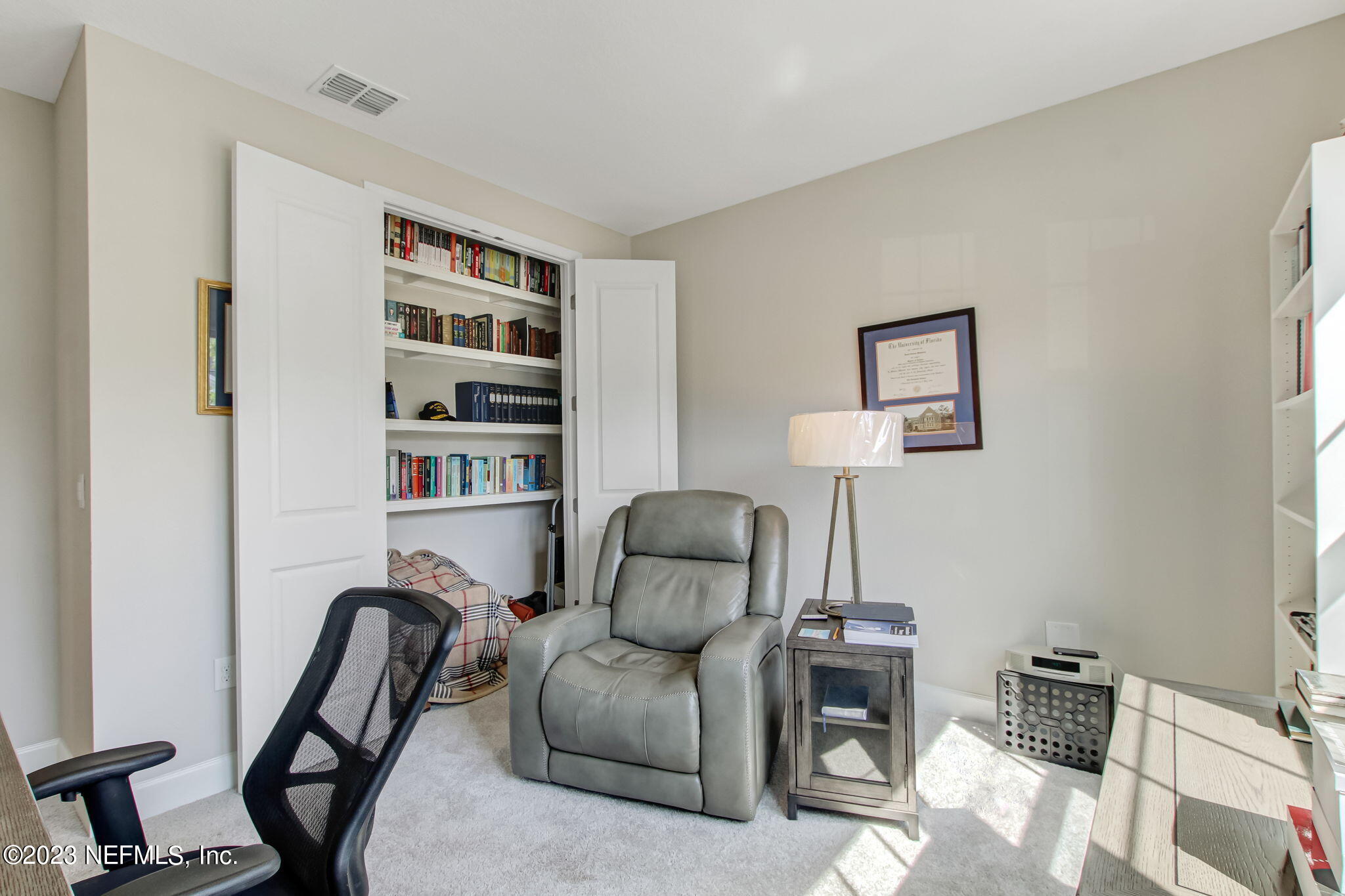 85276 Berryessa Way Yulee, FL 32097 - Photo 26 of 42 a living room with furniture and a chair