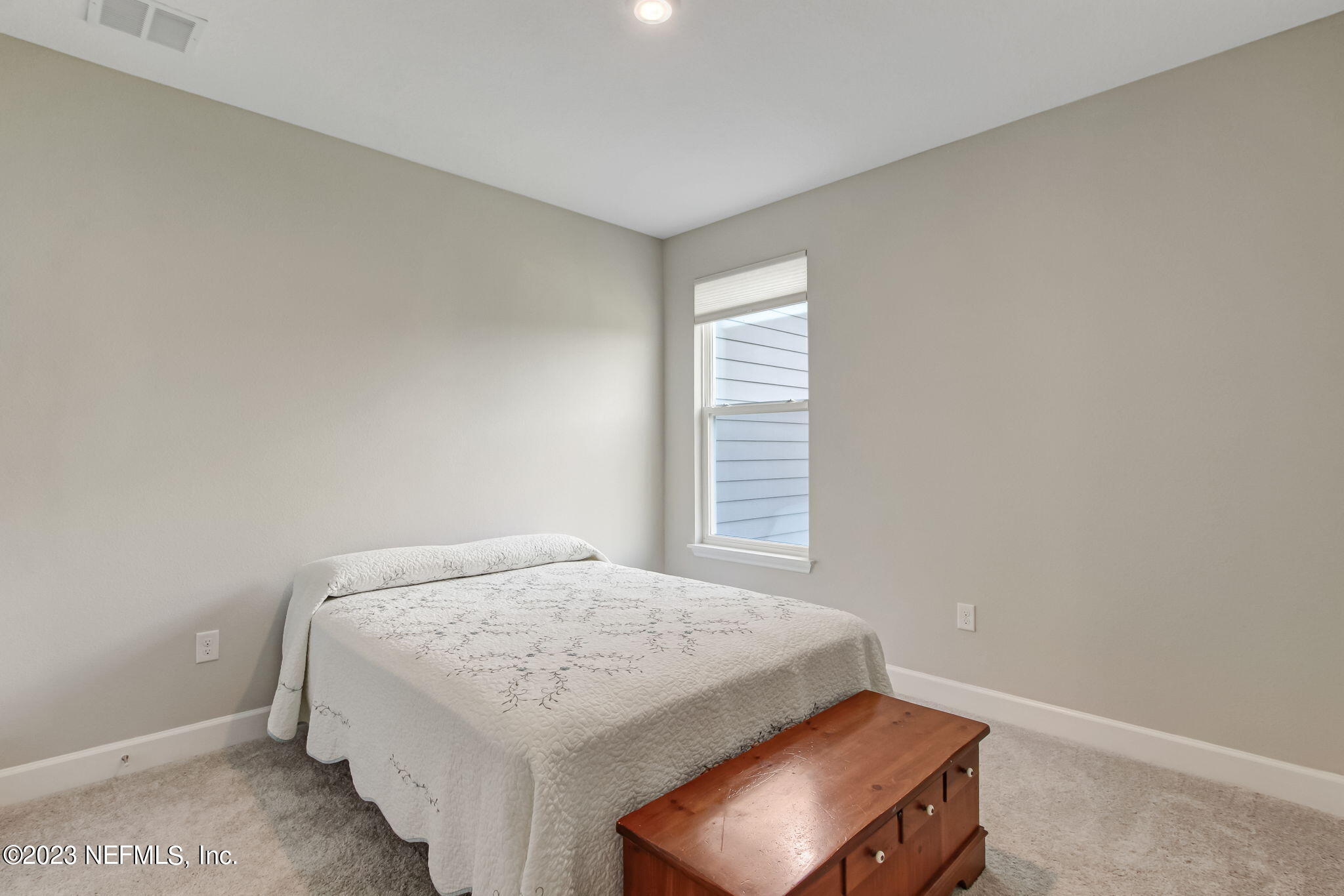 85276 Berryessa Way Yulee, FL 32097 - Photo 28 of 42 a bedroom with a bed and a window