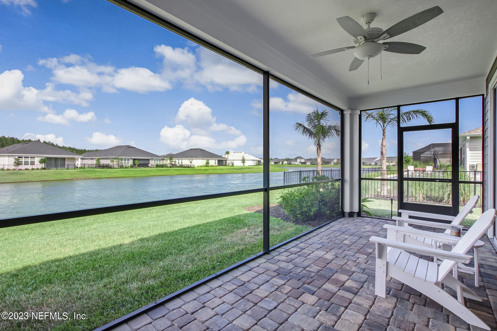 85276 Berryessa Way Yulee, FL 32097 - Photo 32 of 42 a view of a porch with furniture and a yard