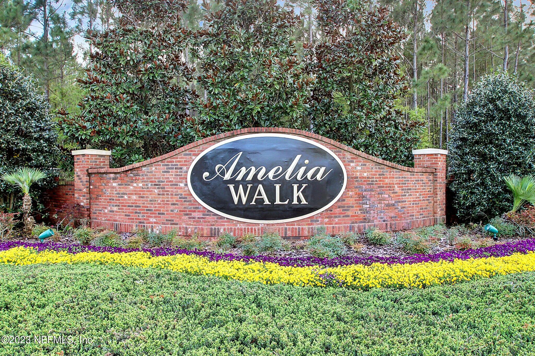 85276 Berryessa Way Yulee, FL 32097 - Photo 34 of 42 a sign that is sitting in front of flowers