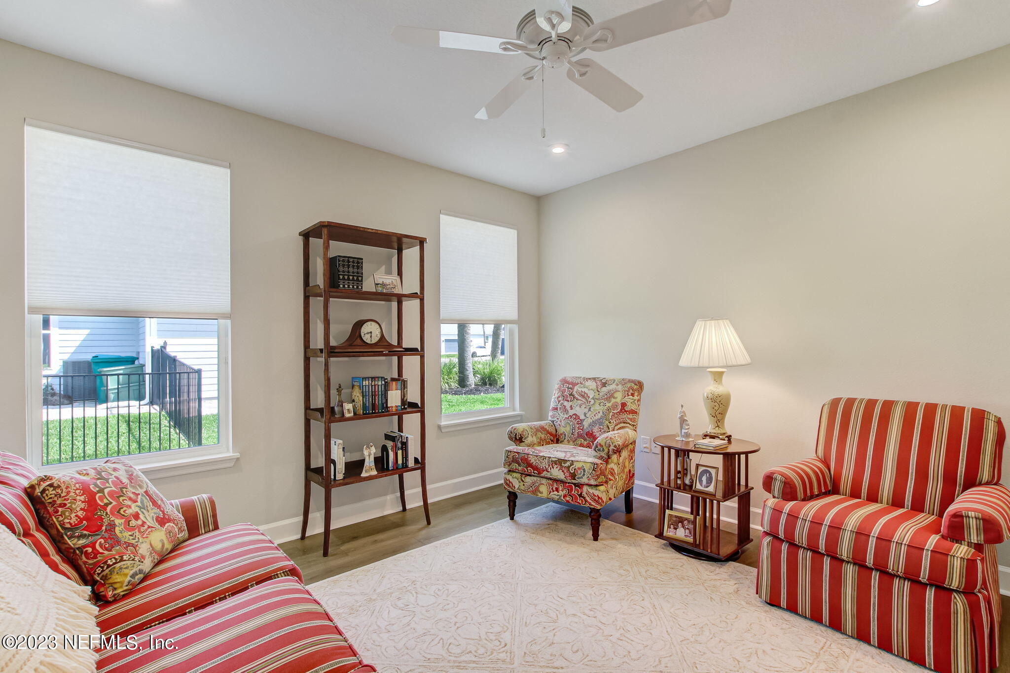 85276 Berryessa Way Yulee, FL 32097 - Photo 5 of 42 a bedroom with furniture and a book shelf