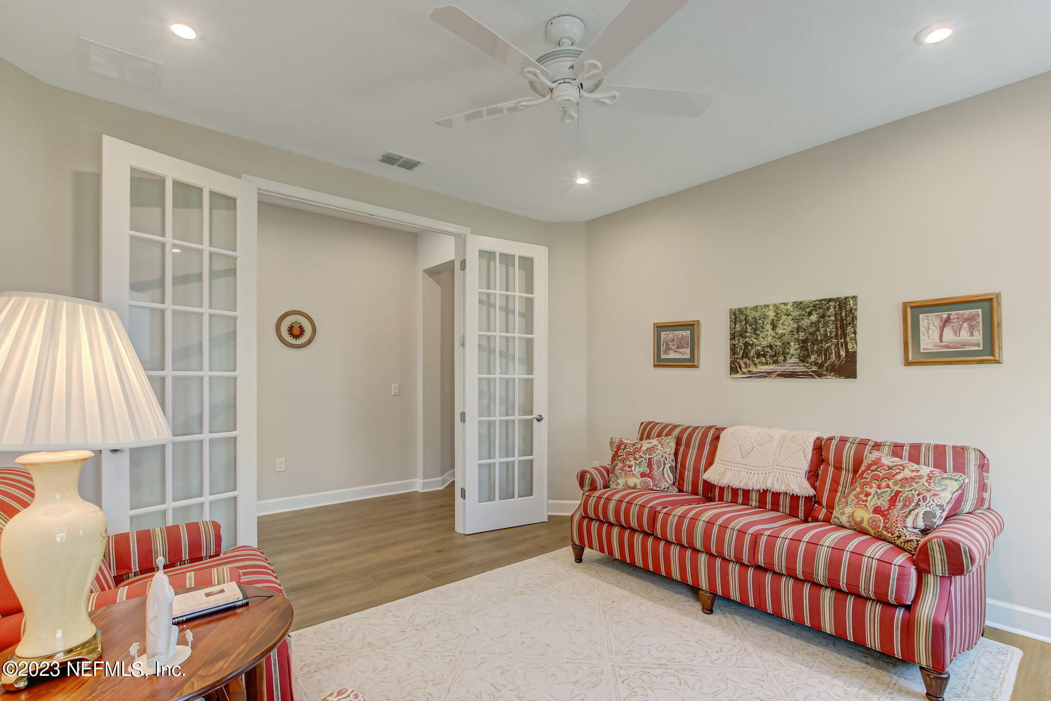 85276 Berryessa Way Yulee, FL 32097 - Photo 6 of 42 a living room with furniture and a potted plant