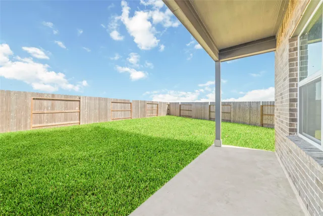 a view of yard with porch