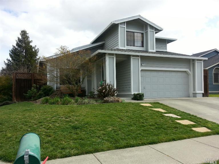 2444 Pinercrest Drive Santa Rosa, CA 95403 - Photo 1 of 1 a front view of a house with a garden and yard