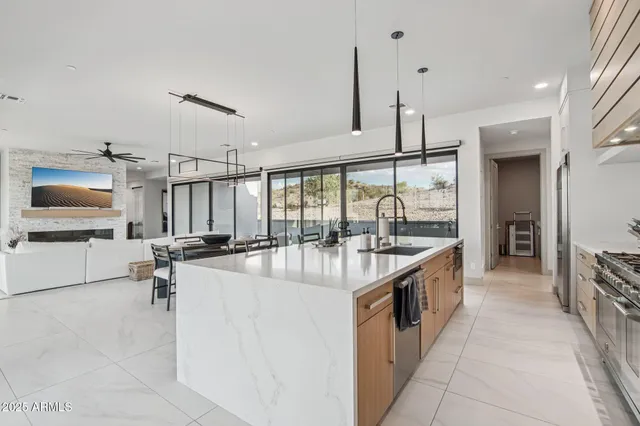 a very nice looking kitchen with a large window