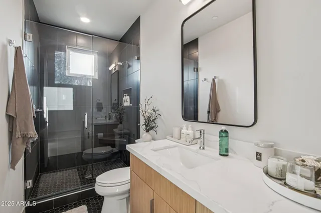 a workspace with furniture and a window