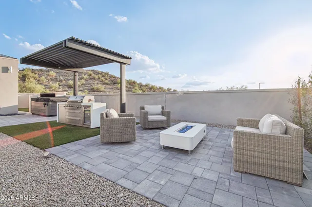 a house view with a backyard space