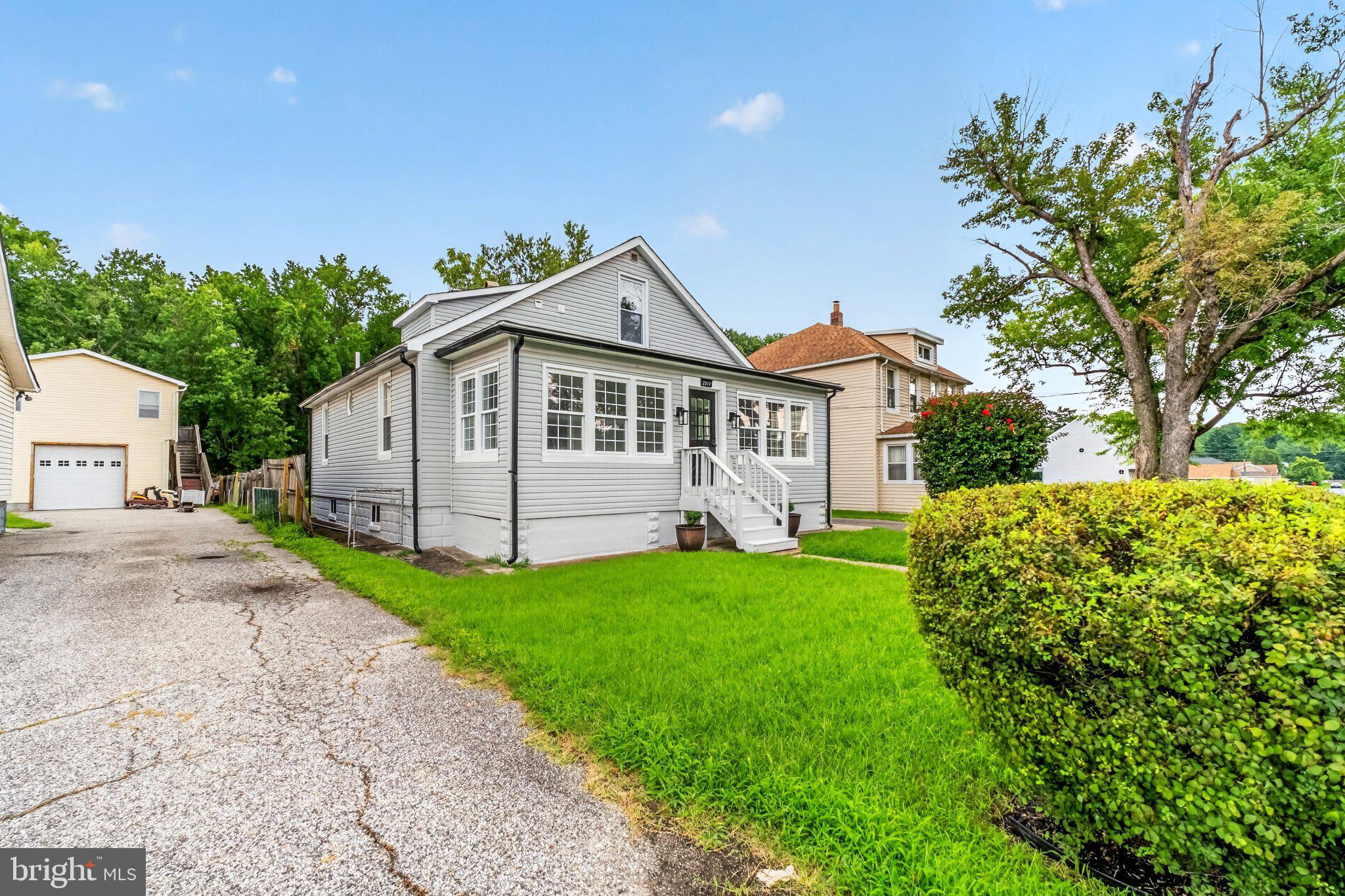 2317 Ruth Avenue Baltimore, MD 21219 - Photo 28 of 29 Charming home with lush green yard.