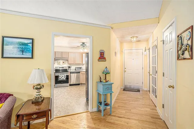 a living room with furniture and a table
