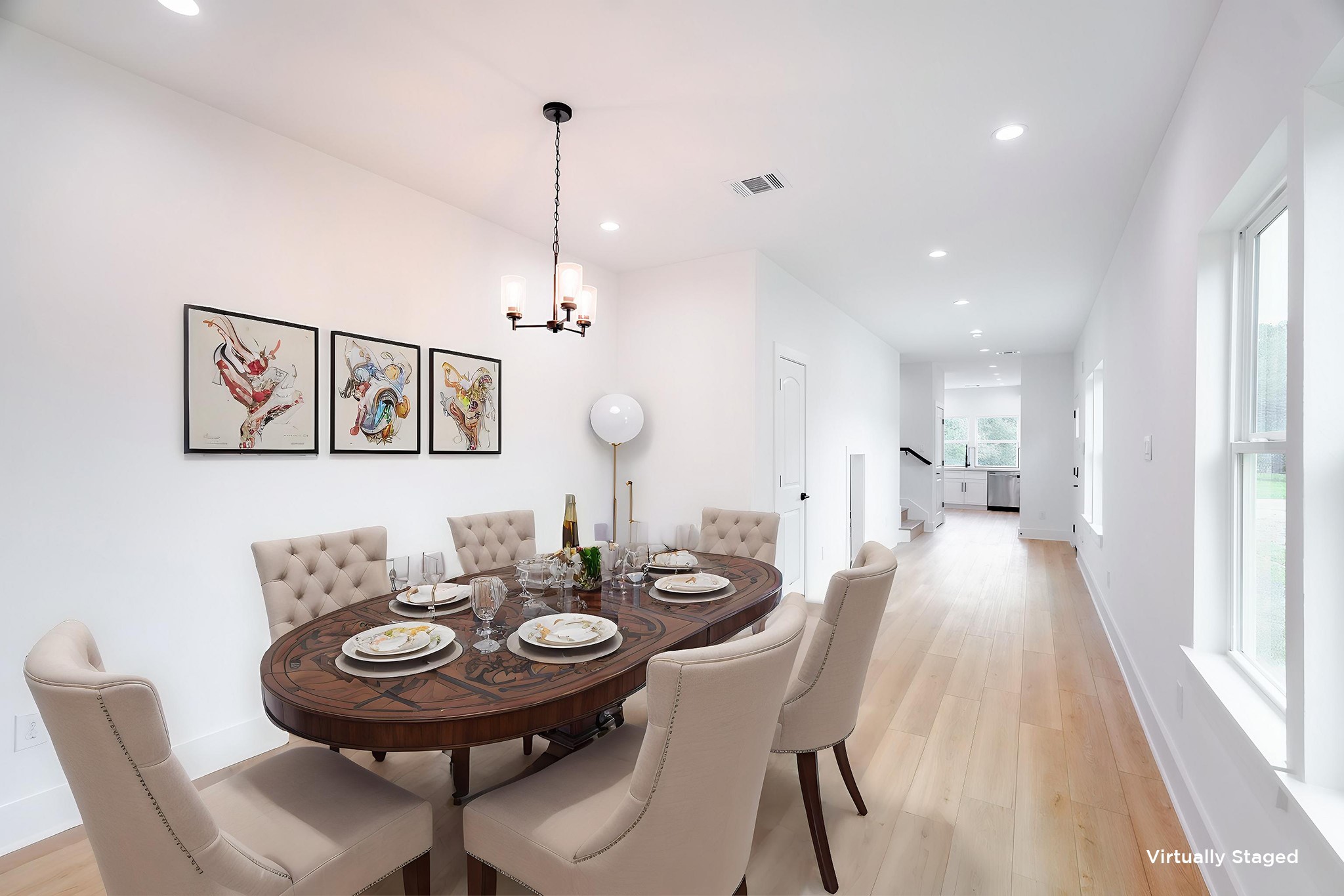 7903 Sunnyhill Street Houston, TX 77088 - Photo 12 of 33 a view of a dining room with furniture window and wooden floor