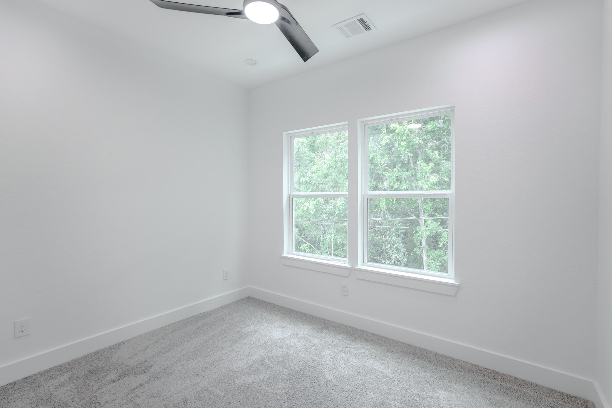 7903 Sunnyhill Street Houston, TX 77088 - Photo 30 of 33 an empty room with a window