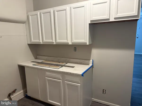 a view of a sink and a window