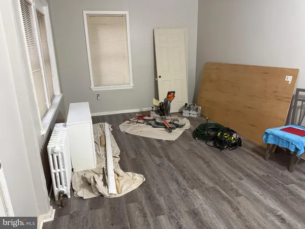 a room with toys and wooden floor
