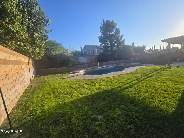 a view of an outdoor space and a yard