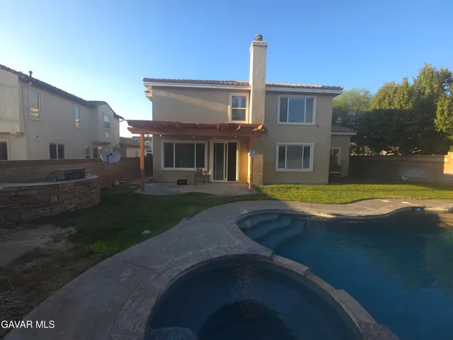 a view of outdoor space yard swimming pool and patio