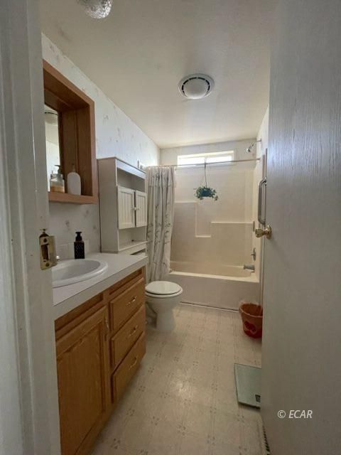 953 Spring Valley Parkway Spring Creek, NV 89815 - Photo 15 of 17 a bathroom with a granite countertop sink a toilet and a shower