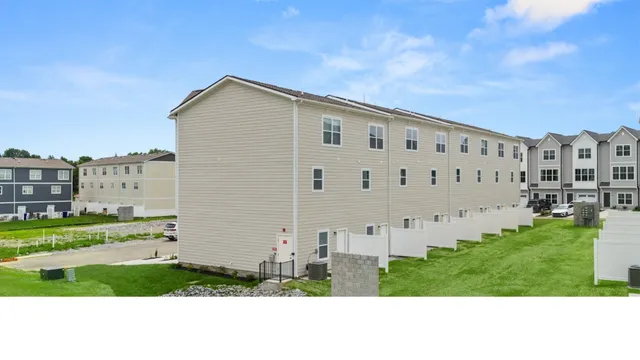 a view of a swimming pool with a lounge chairs