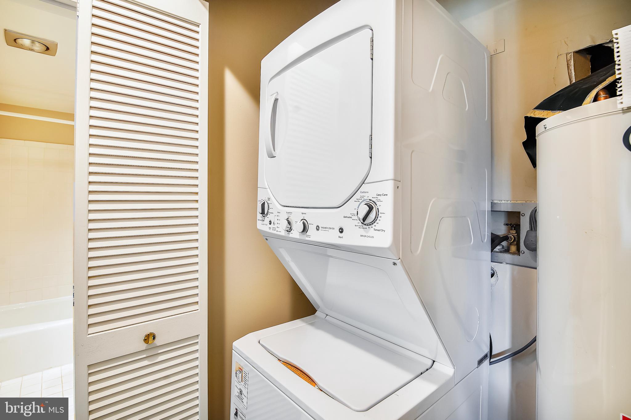 10026 Stedwick Road, Unit 301 Gaithersburg, MD 20886 - Photo 19 of 24 LAUNDRY IN UNIT W/STACKABLE WASHER & DRYER
