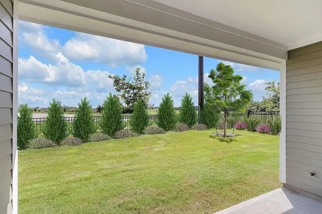a view of a golf course with a swimming pool