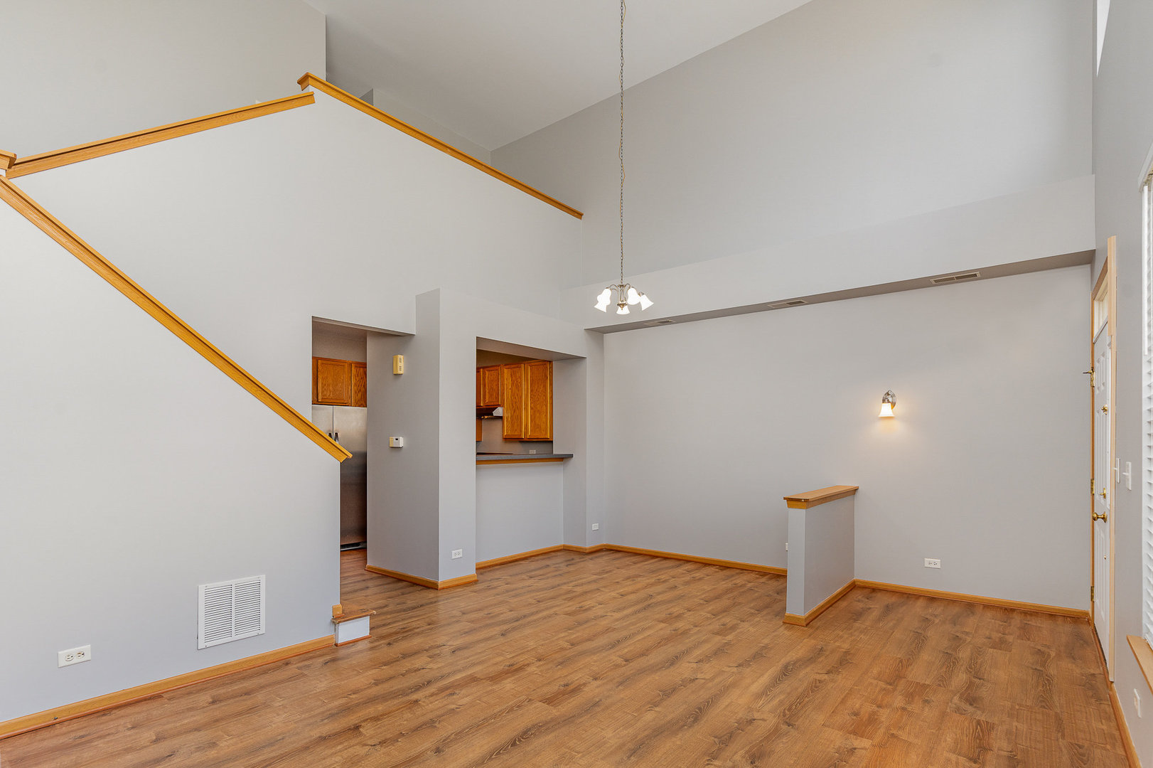 2255 Georgetown Circle Aurora, IL 60503 - Photo 5 of 14 a view of empty room with wooden floor