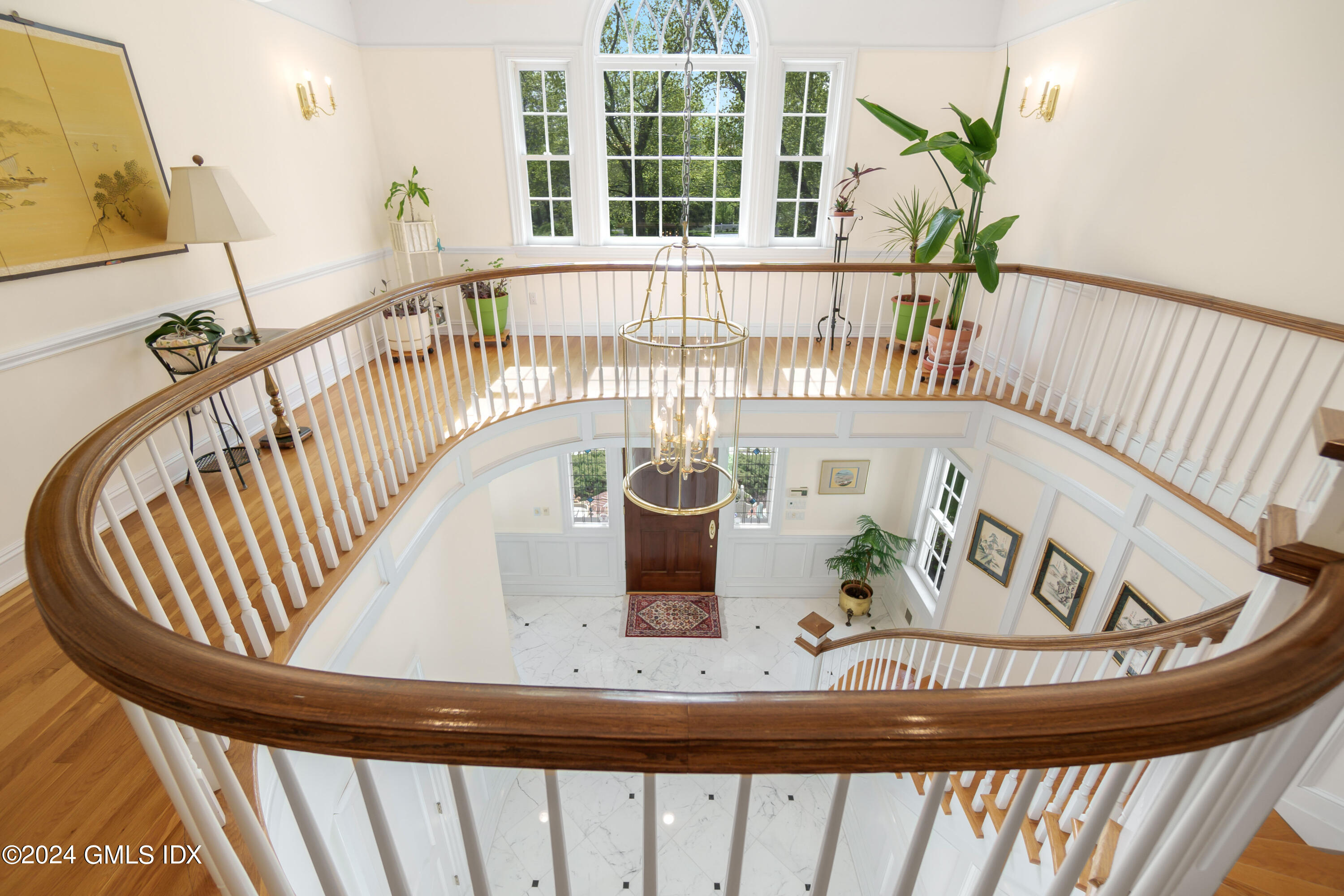 719 Ponus Ridge Road New Canaan, CT 06840 - Photo 11 of 38 a view of a living room and wooden floor
