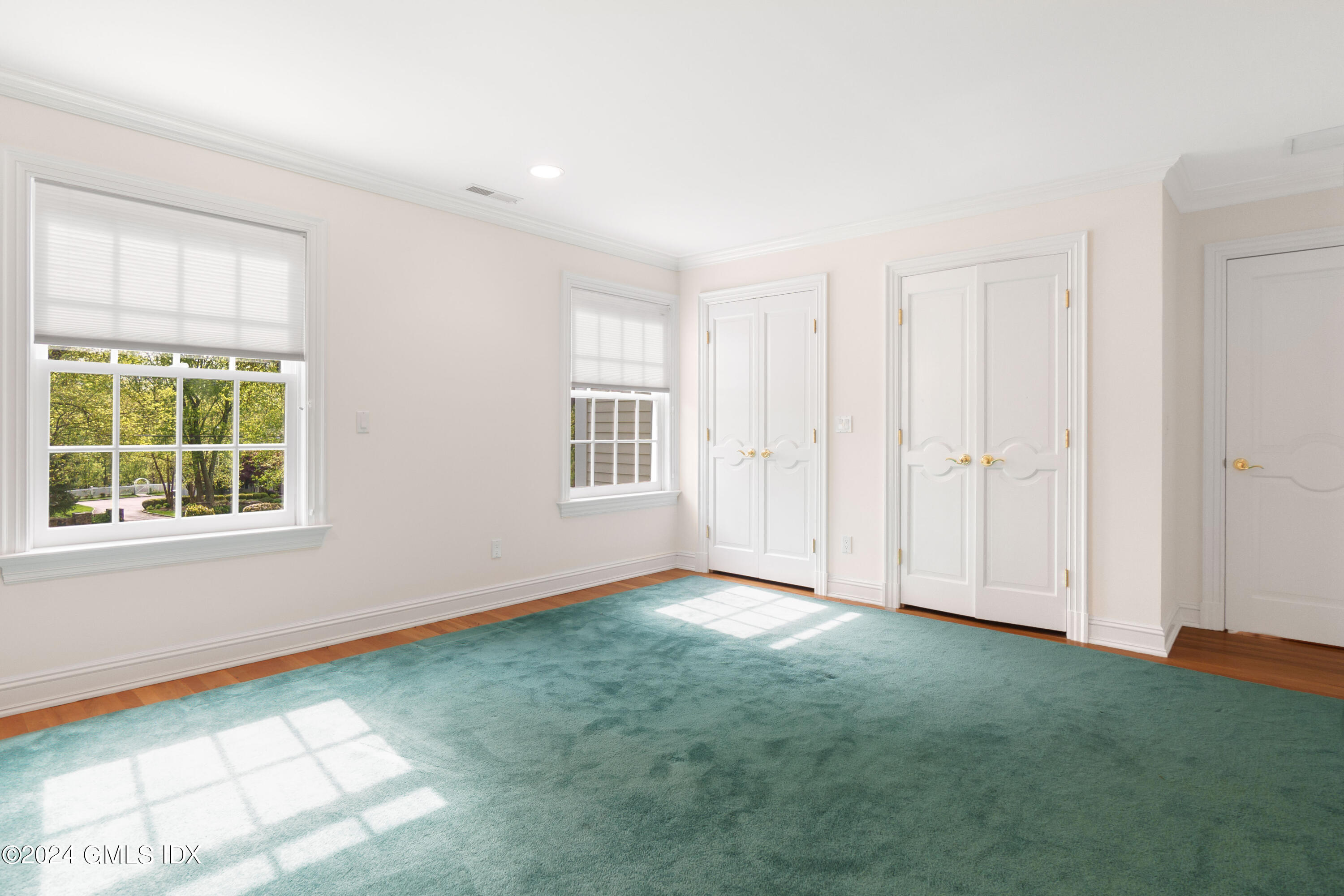 719 Ponus Ridge Road New Canaan, CT 06840 - Photo 18 of 38 an empty room with windows