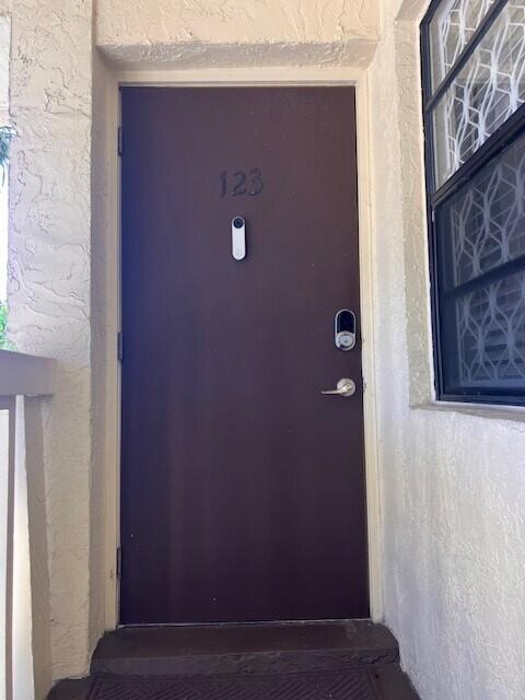 140 South Cypress Road, Unit 123 Pompano Beach, FL 33060 - Photo 2 of 23 a view of door