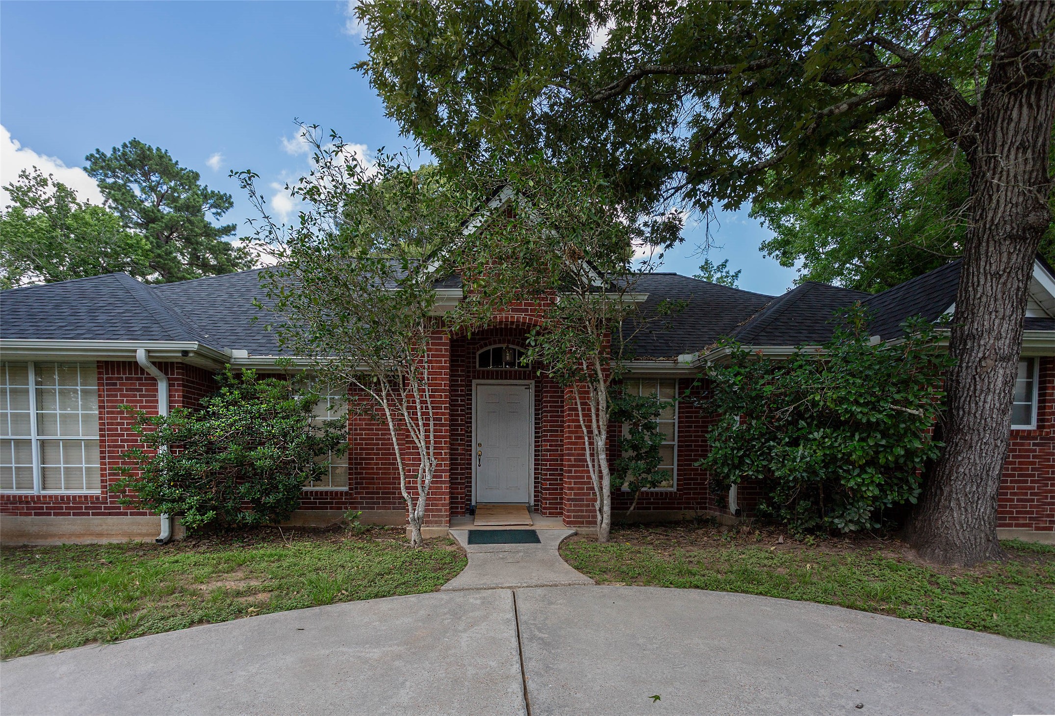 217 Tupelo Lane Conroe, TX 77304 - Photo 1 of 26 Front of Home