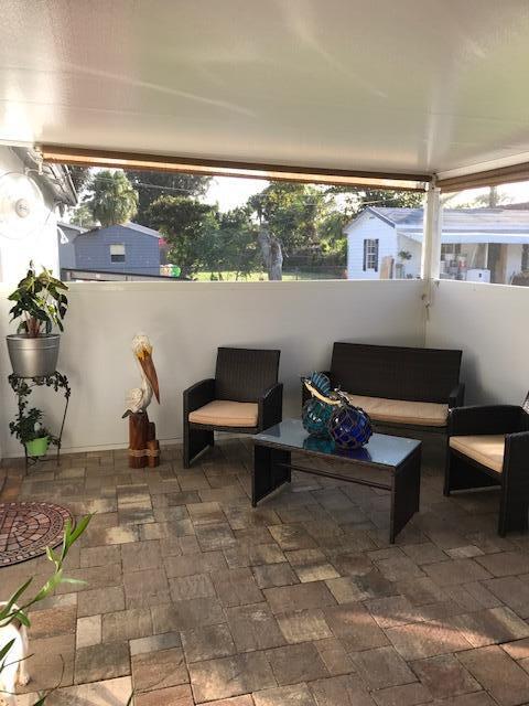 1141 Cheryl Road Haverhill, FL 33417 - Photo 14 of 20 screened patio