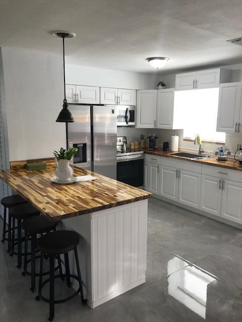 1141 Cheryl Road Haverhill, FL 33417 - Photo 5 of 20 Kitchen