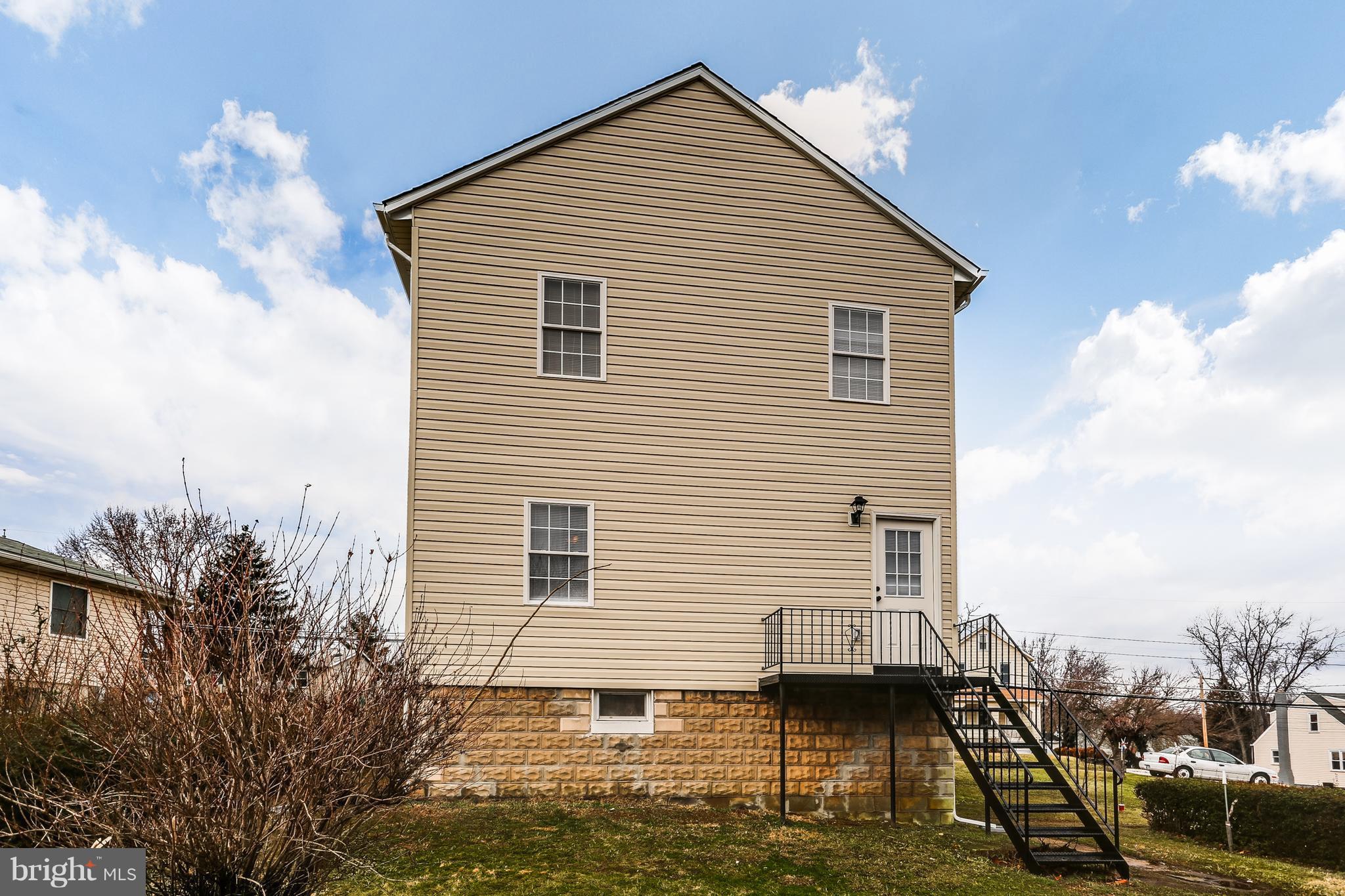 7907 Underhill Road Baltimore, MD 21237 - Photo 26 of 27 a view of a house with a yard