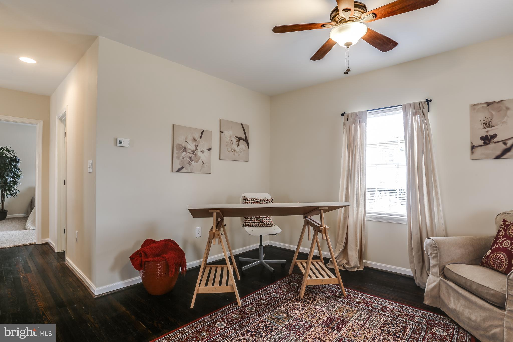 7907 Underhill Road Baltimore, MD 21237 - Photo 8 of 27 a view of a livingroom with furniture