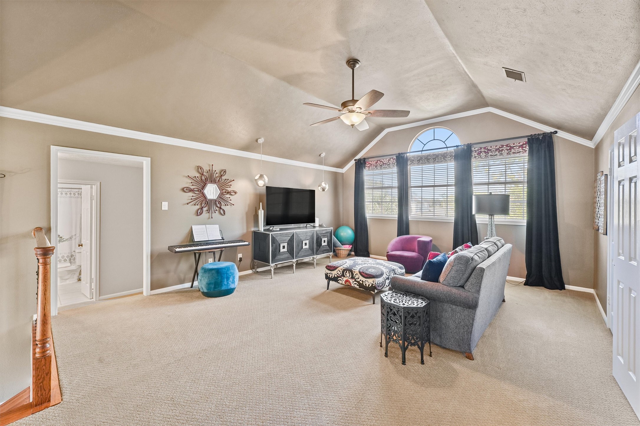 3006 Rothbury Drive Pearland, TX 77584 - Photo 15 of 28 a living room with furniture a flat screen tv and a large window