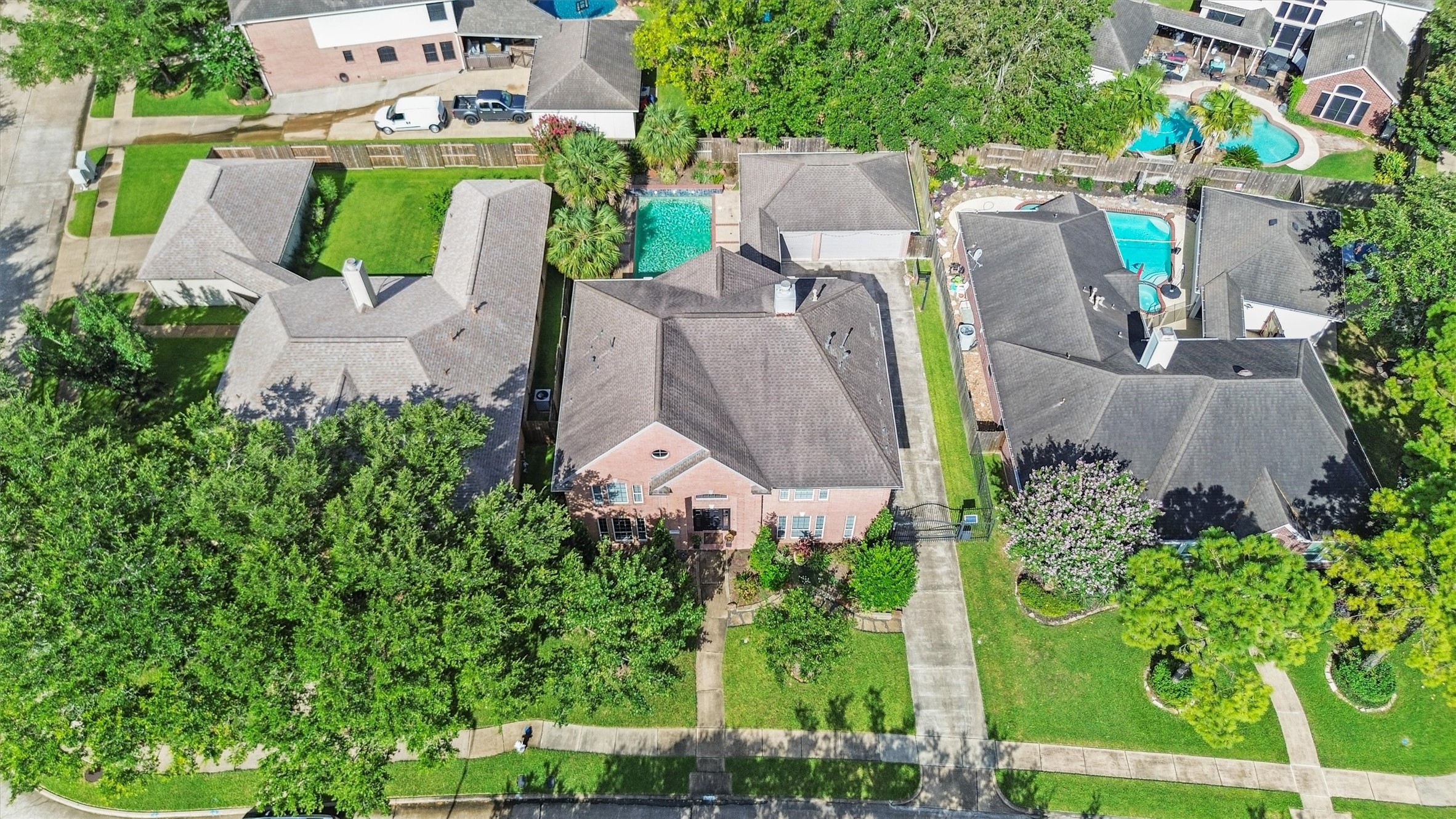 3006 Rothbury Drive Pearland, TX 77584 - Photo 25 of 28 an aerial view of a house with garden space and street view