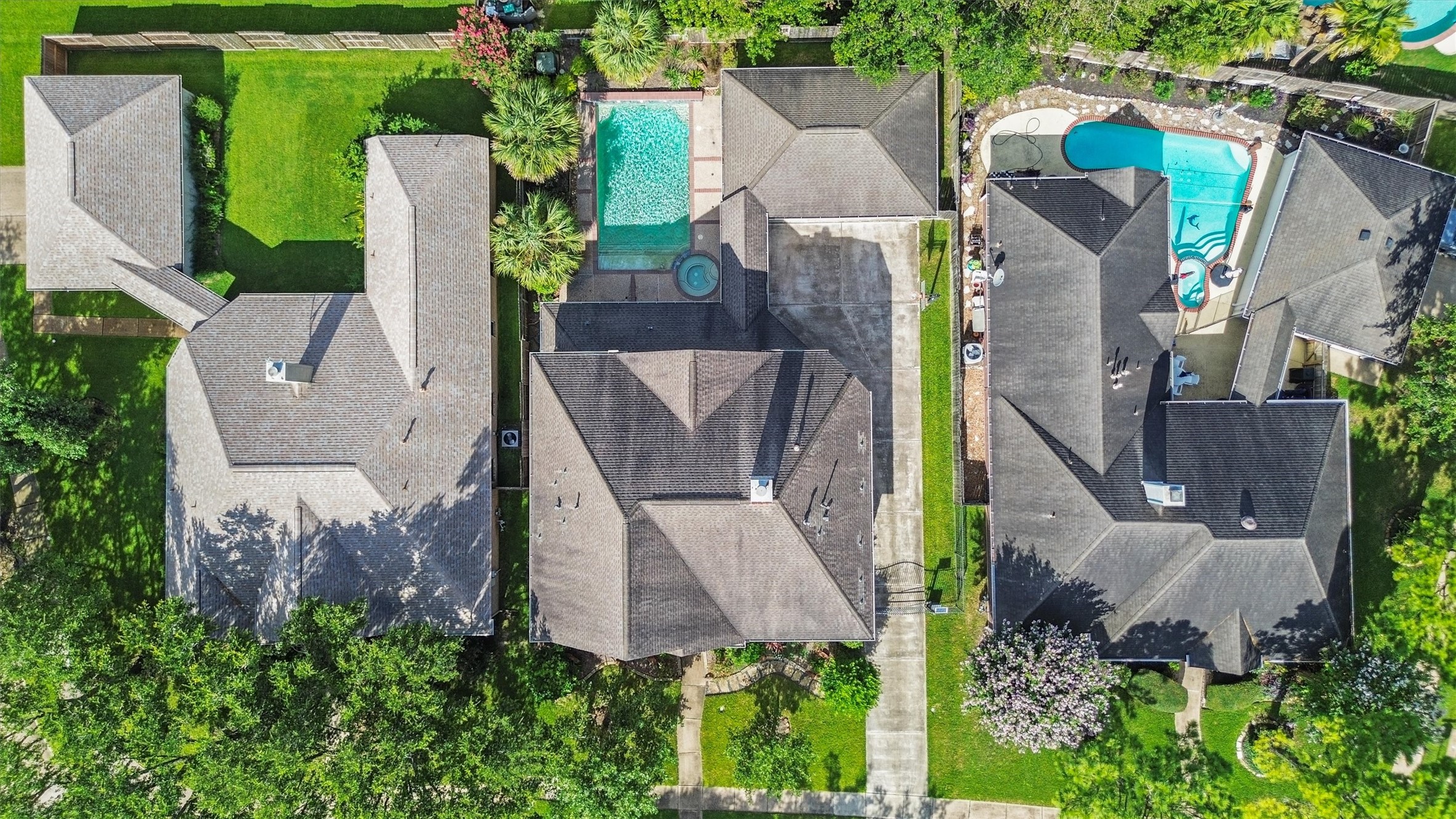 3006 Rothbury Drive Pearland, TX 77584 - Photo 26 of 28 an aerial view of a house with outdoor space and parking