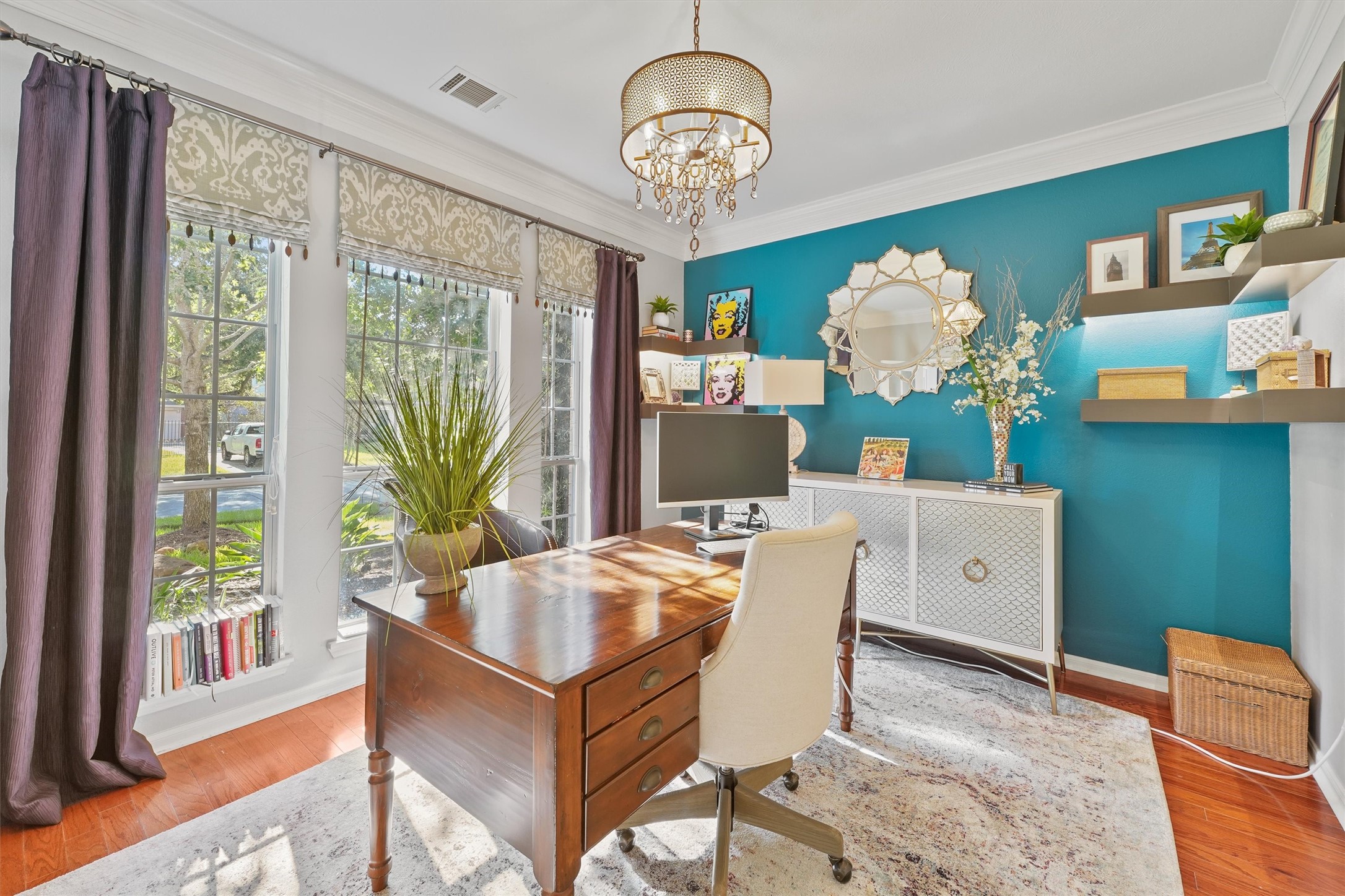 3006 Rothbury Drive Pearland, TX 77584 - Photo 4 of 28 a room with a table chairs and chandelier