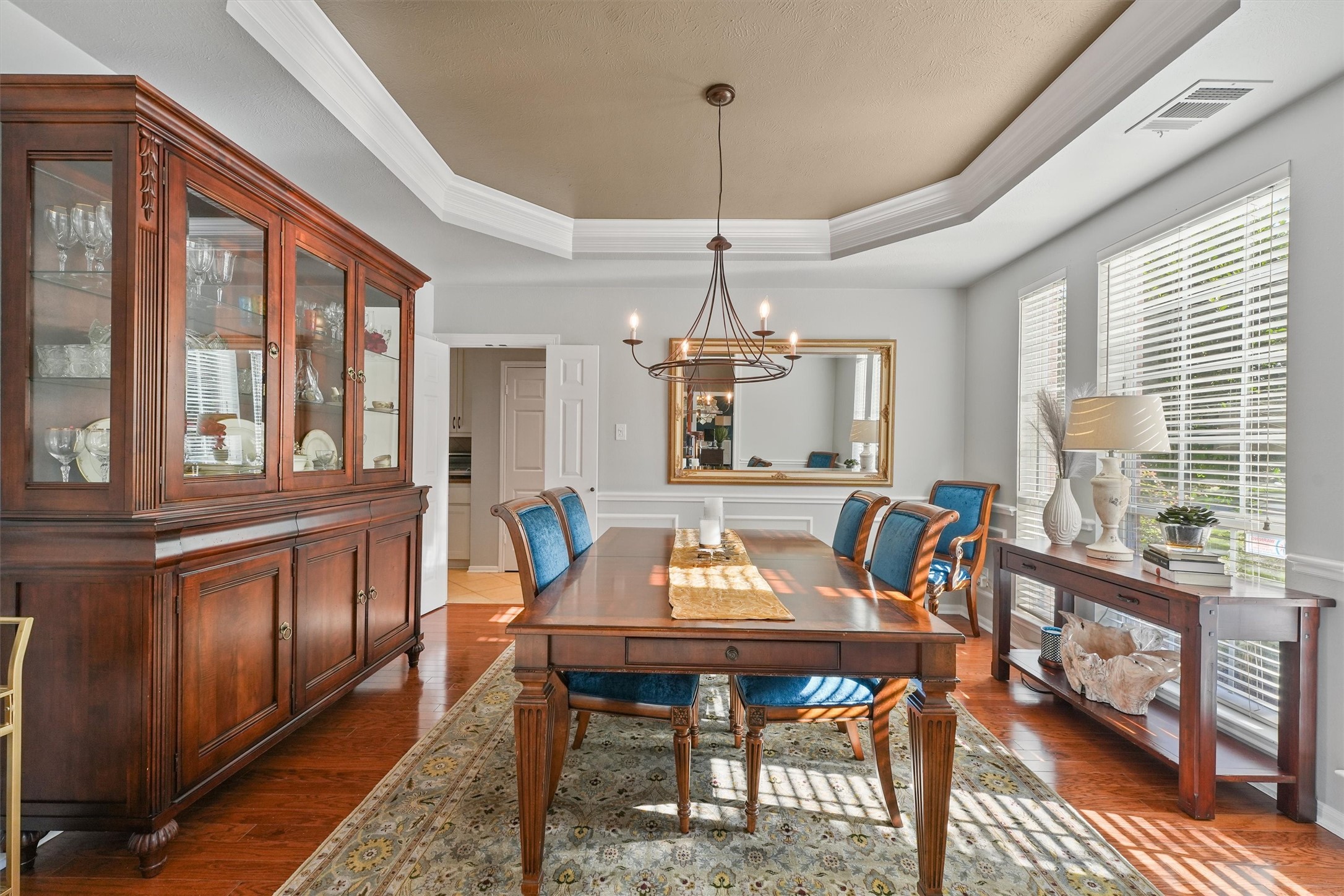 3006 Rothbury Drive Pearland, TX 77584 - Photo 5 of 28 a view of a dining room with furniture window and wooden floor
