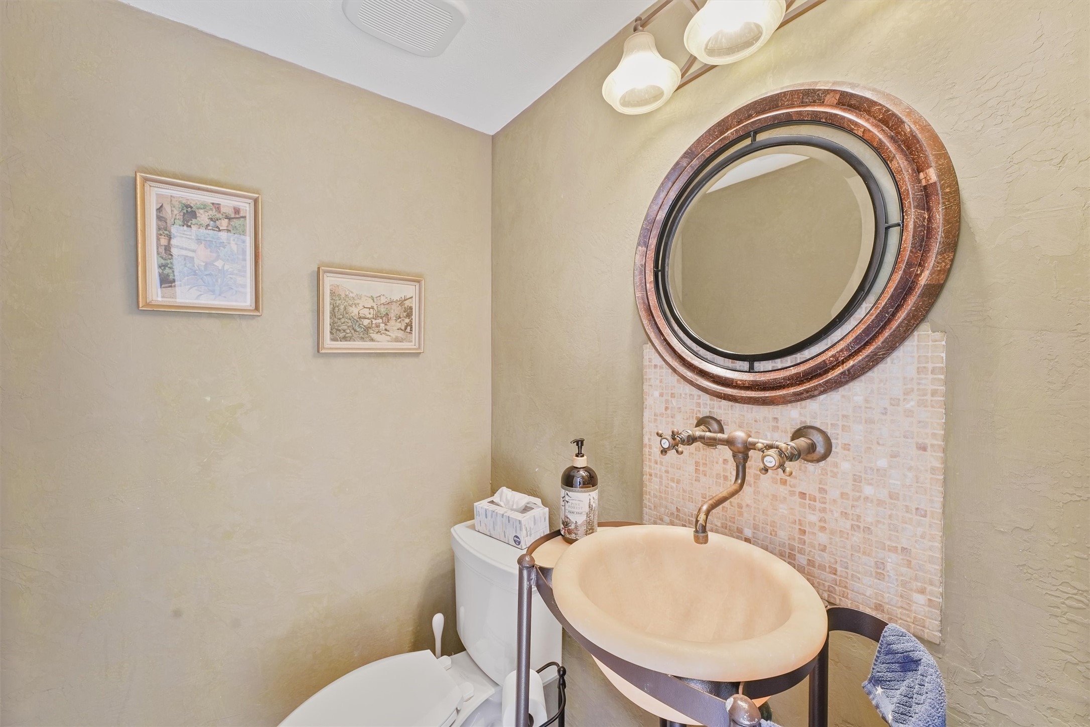 3006 Rothbury Drive Pearland, TX 77584 - Photo 8 of 28 a bathroom with a toilet a sink and a mirror