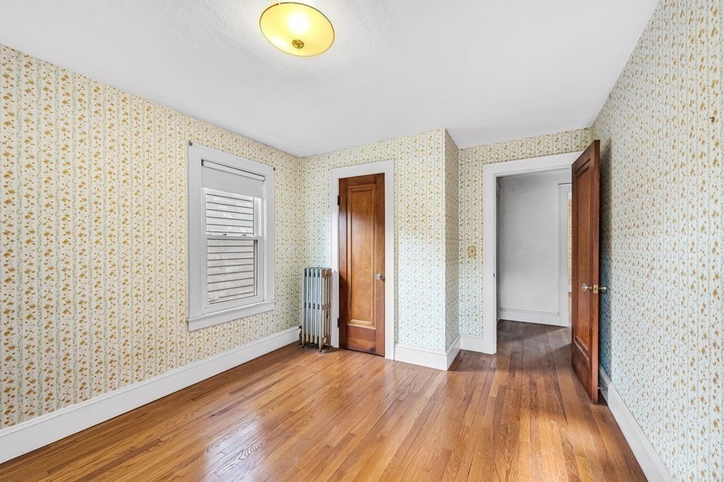 104 Eleanor Road Springfield, MA 01108 - Photo 23 of 33 a view of empty room with wooden floor